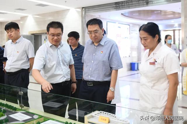 河南中医药大学党委书记别荣海一行来院调研