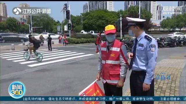 南京：外卖小哥多次闯红灯丢饭碗 路口执勤信用修复成功