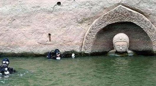 江西一水库水位下降，露出大量佛像，专家：来