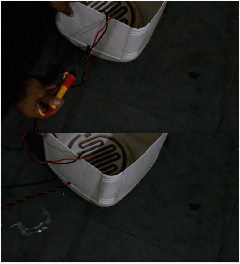 切开塑料桶并装入电热圈，用它刚洗的衣服也能快速烘干