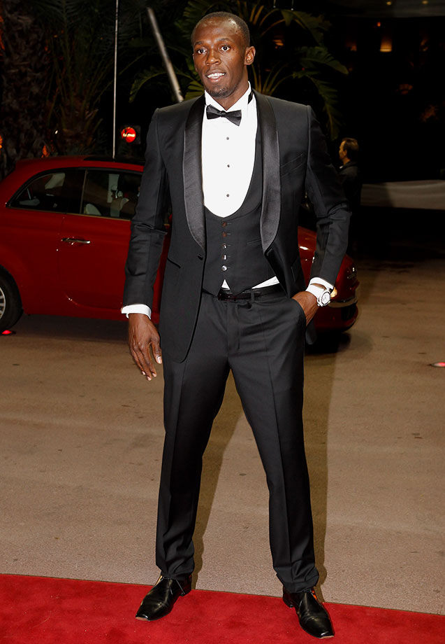 2011年,博尔特西装革履参加国际田联颁奖典礼.