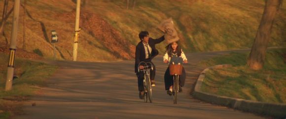 空纳万境，距离即“美”——《情书》中的“留