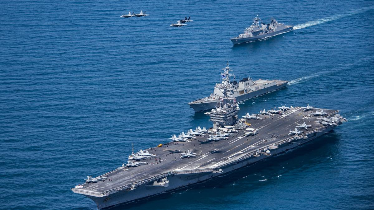 美军舰不断闯入我领海，中美南海斗争加剧，中国需加快海军建设