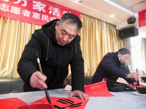 淮安文化志愿者新春佳节前夕惠民送祝福
