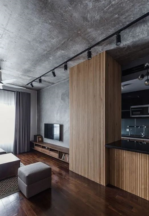 买了精装修房，直觉电视背景墙太单调，考虑岩板上墙提高装修档次