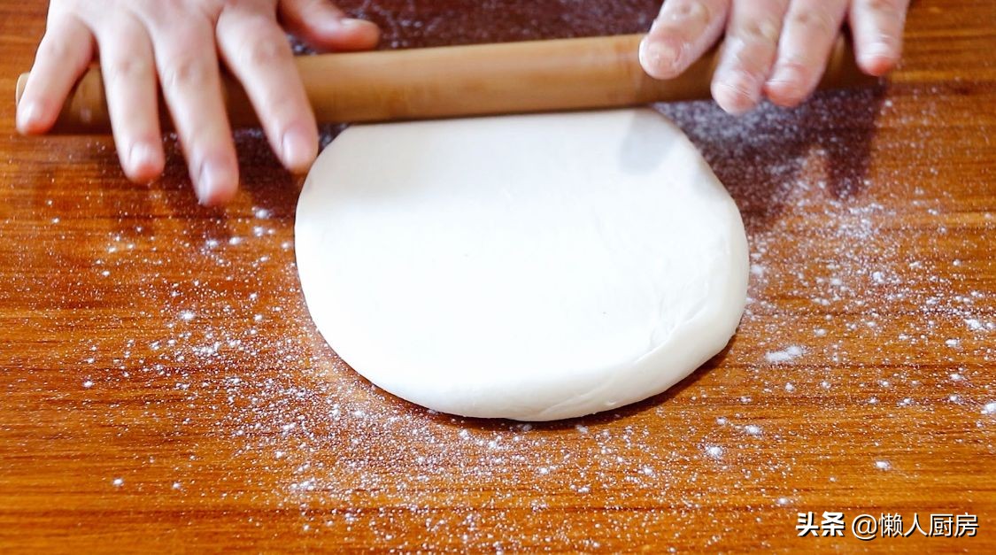 過年做這道小吃，包滿花生餡，寓意錢包滿，是招待客人必備的食品