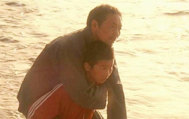 20年前，因“背起爸爸上学”感动中国的李勇，如