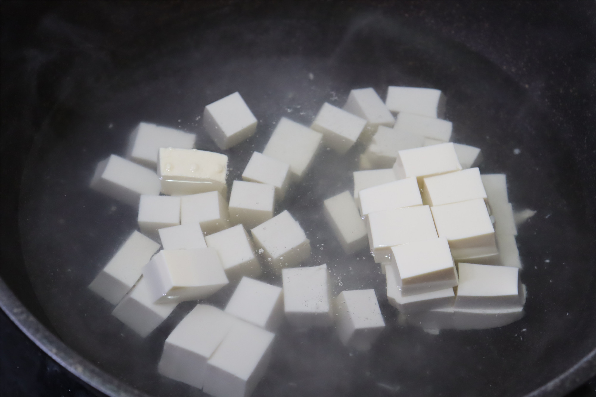 Eating tofu and rice. My family only loves this one. I don’t bother to eat 7 meals a week. The rice has to be steamed in a big pot.