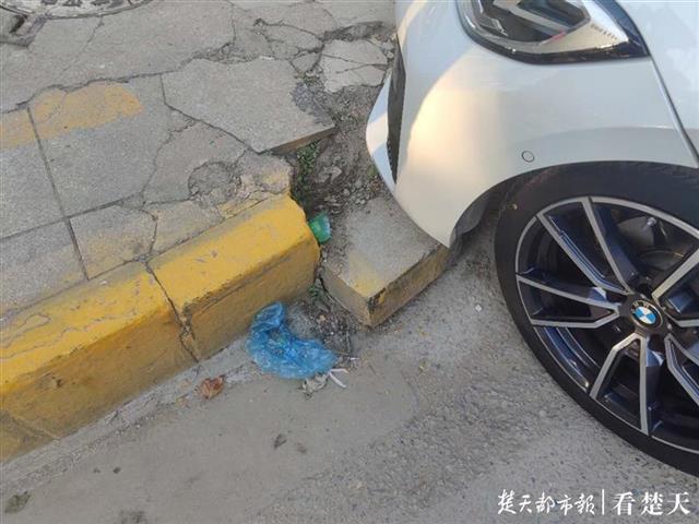 破损马路牙困住宝马 附近商户称该处事故频发 社会 爆资讯新媒体平台