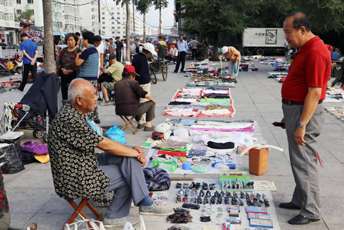 允许摆地摊，对高价门面房会形成打击吗？