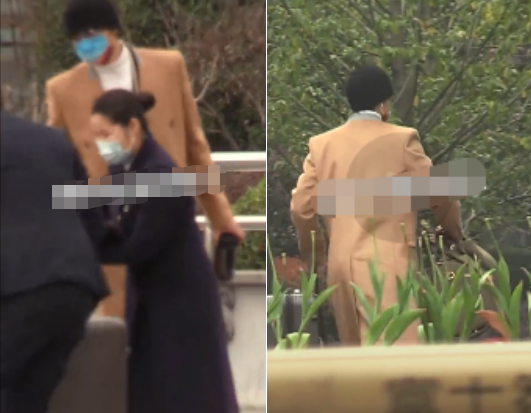 39歲朱丹和老公接孩子放學(xué)，身形臃腫肚腩突出，前后行走顯疏離