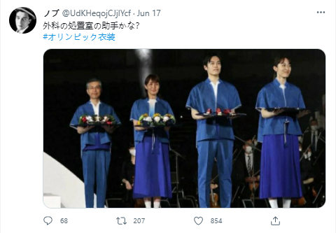 这样的美实在接受不来！东京奥运会颁奖典礼志愿者礼服遭日本网友吐槽：像从隔离病房逃跑的病毒感染患者