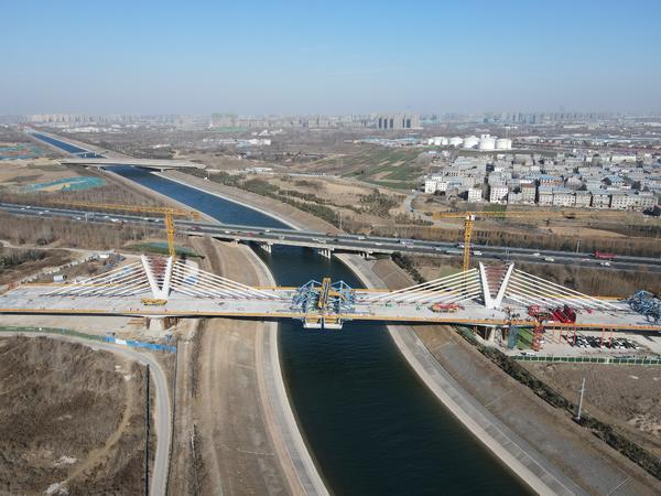 又传好消息！国道310线郑州西南段改建工程跨南水北调特大桥顺利合龙