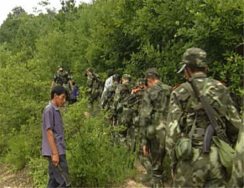 7·14汉阴特大杀人案：因怀疑妻子不忠，在道观连杀10人，留下血字