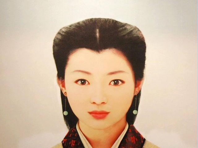 图29 辛追夫人复原画像这一个谜,至今仍没有解开.