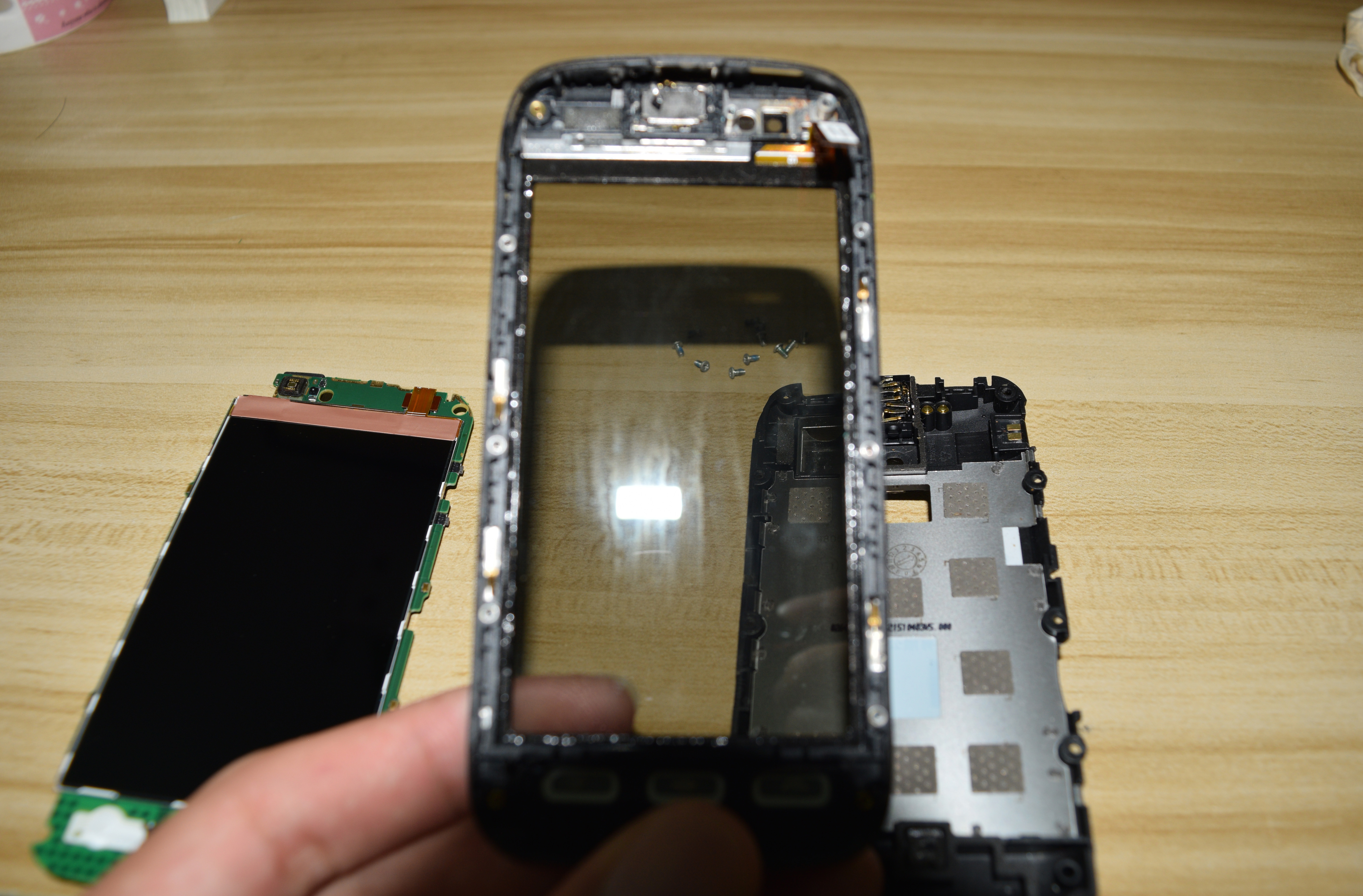 拆卸二零一一年Symbian Belle新手入门机Nokia603，当初加价能上小米1了