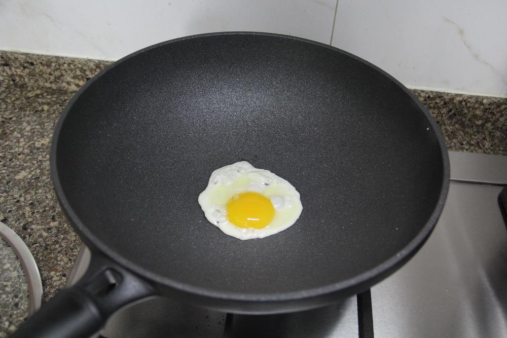 九阳晶钻耐磨不粘锅：一款敢随锅送钢铲的明火锅